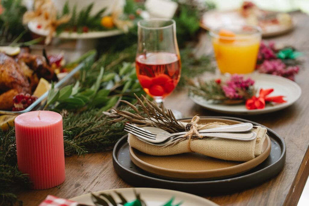 Delicious dinner with roasted chicken served on table with Christmas decorations